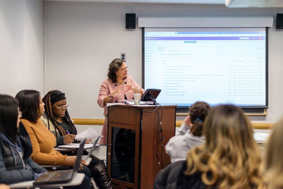 At NYUs Silver School of Social Work Dr Diane Mirabito clinical professor and practice curriculum shair engages MSW students in her Social Work Practice III class where they broaden their assessment and intervention skills by learning several major theaters and practice models